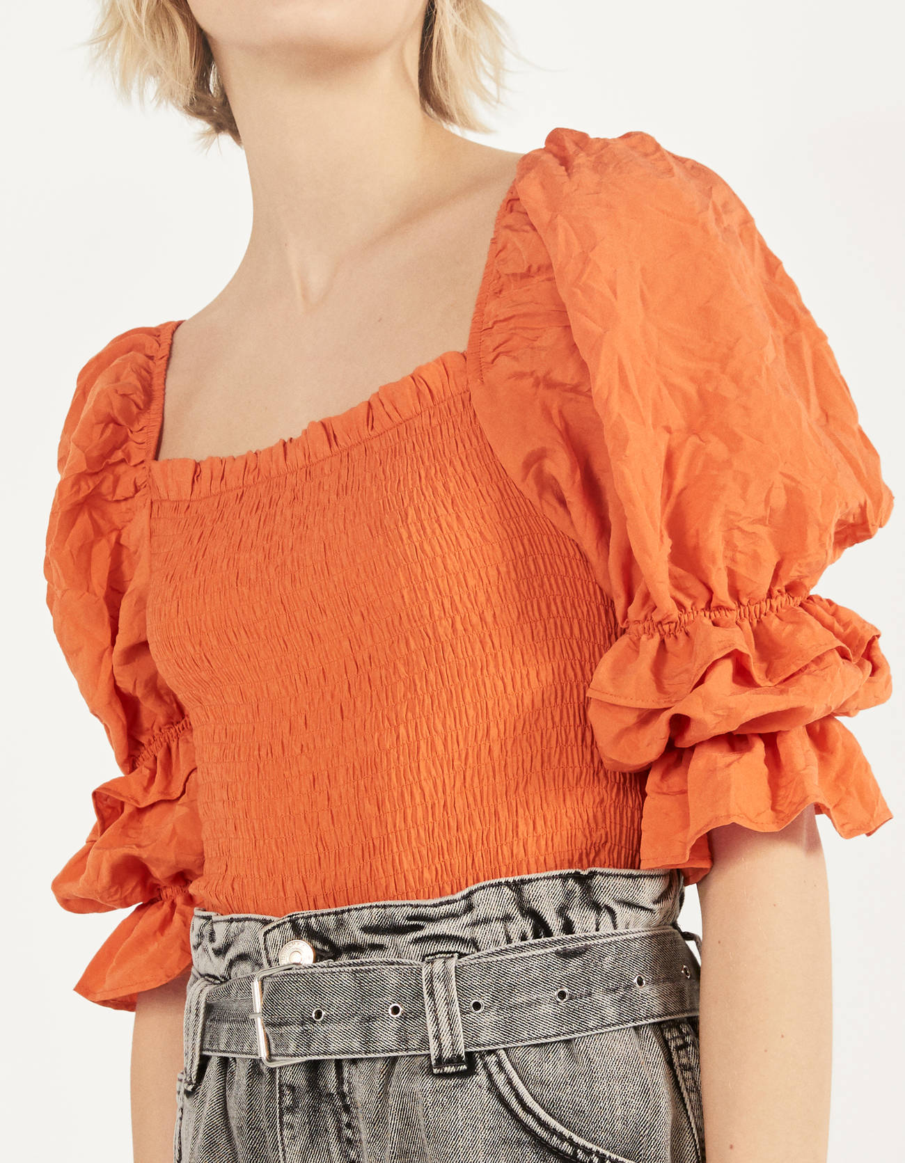 Orange blouse with volume