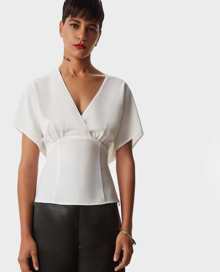 Short-sleeved plain women's blouse with a crossover neckline