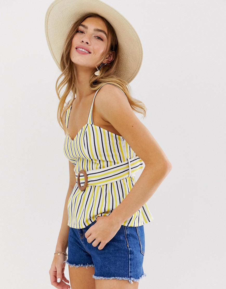 Striped summer top with overskirt and belt.