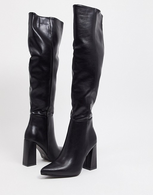 High boots with wide shank and thick heel