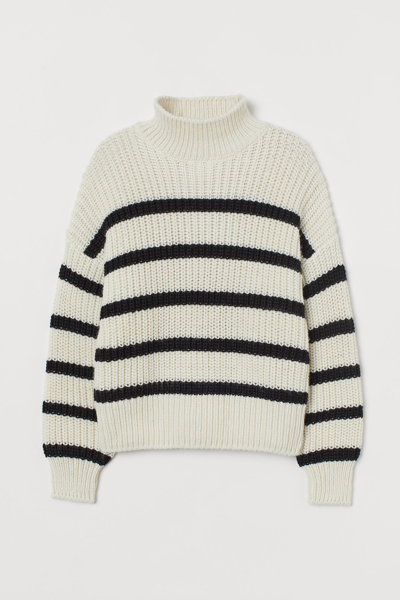 Boxy sweater in soft knit with wool in the weft. Model with ribbed perkins collar, dropped shoulders and ribbed elastic cuffs and hem. Made from recycled polyester.