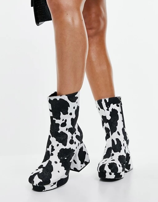 Imagine cow print mid platform boots from Public Desire.