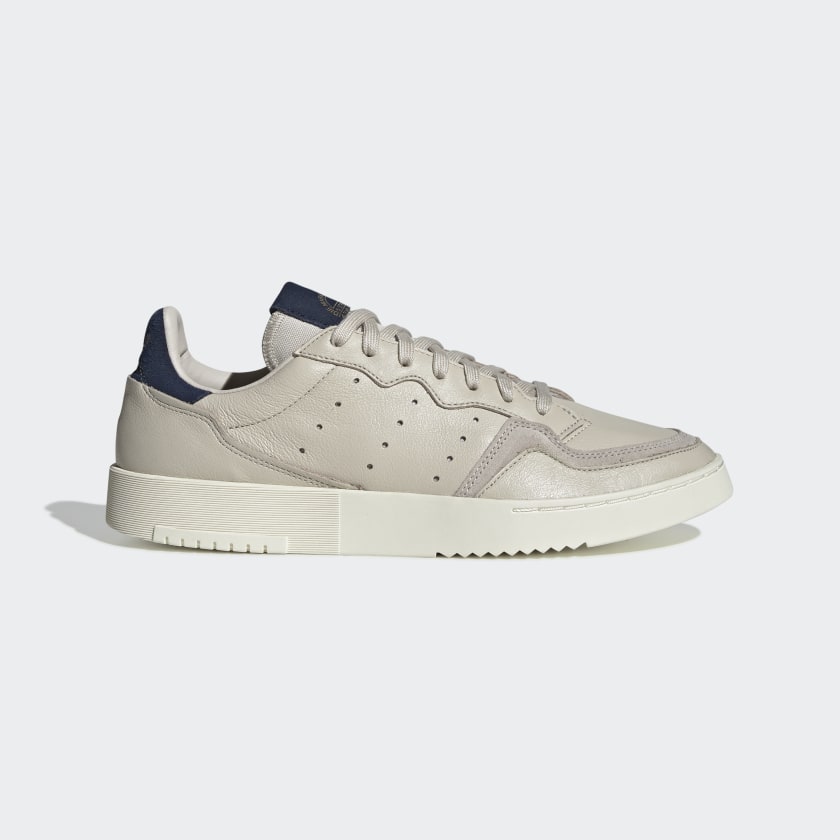 The Supercourt is the result of combining adidas' best tennis designs. This sneaker features a soft leather upper and a sculpted rubber outsole.